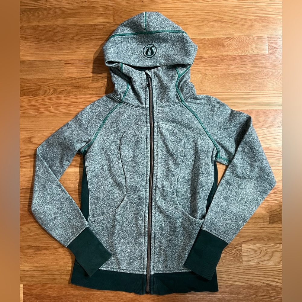 Lululemon Women’s blue/teal zip up sweatshirt, size 6.